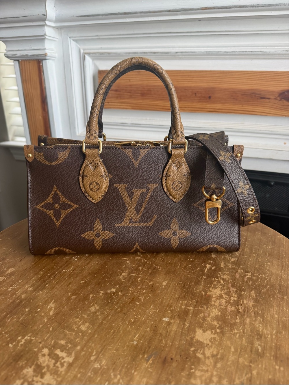 Sold on my fb. Louis Vuitton OnTheGo East West in Reverse Monogram with monogram
